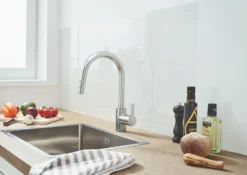 Grohe Feel - Keukenkraan Met Uittrekbare Sproeikop, Supersteel 31486DC1 -Sanitino Winkel d5dc08468b3f0034d5bbeaf2